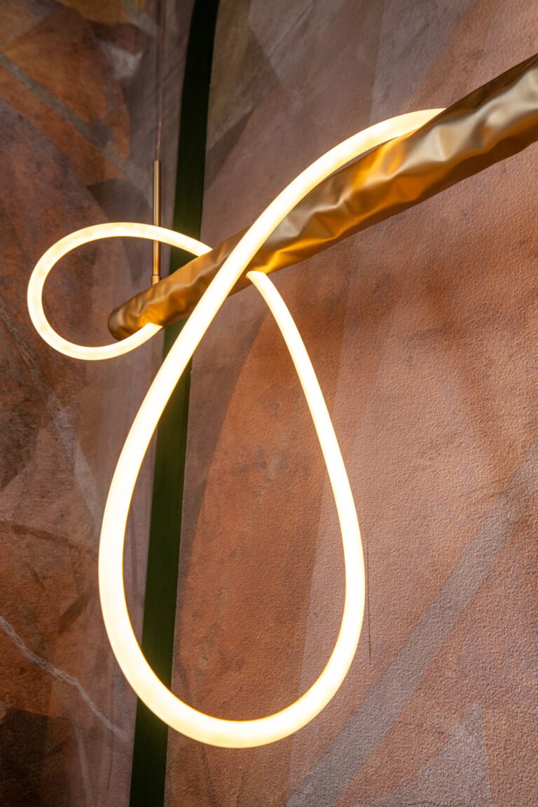 Sculptural light in matt stainless steel finish