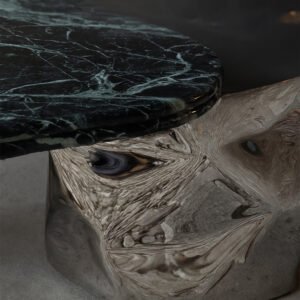 Edge detail of Colgada Coffee Table’s marble and steel