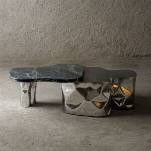 Angled view of Colgada Coffee Table with layered steel texture