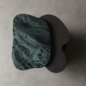 Top-view close-up of the Colgada Side Table’s green-spider marble surface with natural veining