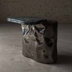 Colgada Side Table in sculpted polished stainless-steel base with organic green-spider marble top – front view