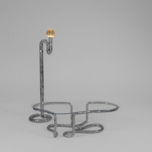 Lasso Coffee Table with rope-inspired polished steel base and glass top, paired with Lasso Floor Lamp