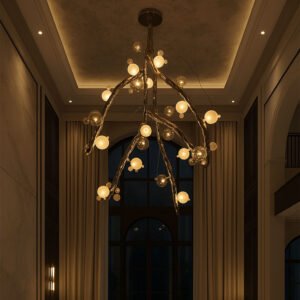 Molecule Canopy Light — sculptural chandelier in polished stainless-steel branches with glowing blown-glass globes suspended in a luxury double-height foyer