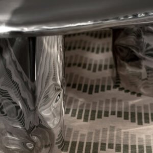 Pebble Coffee Table base detail with undulating polished stainless steel surface