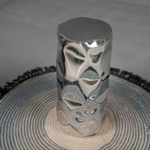 Detail of Tronco Drinks Table reflecting textures, handcrafted by Nitush–Aroosh in stainless steel