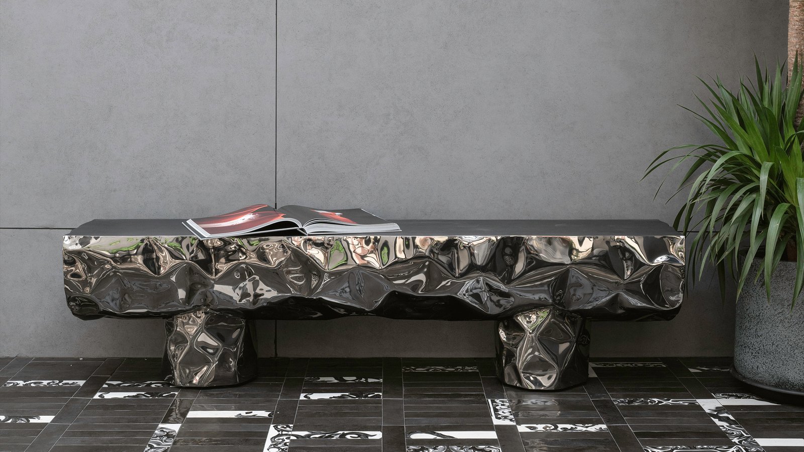 Stainless steel sculptural bench by nitush aroosh